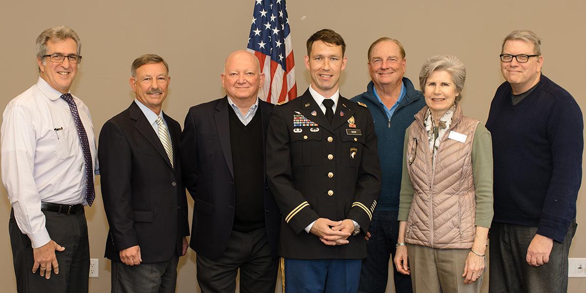 Justin Winn with family and CUI professors
